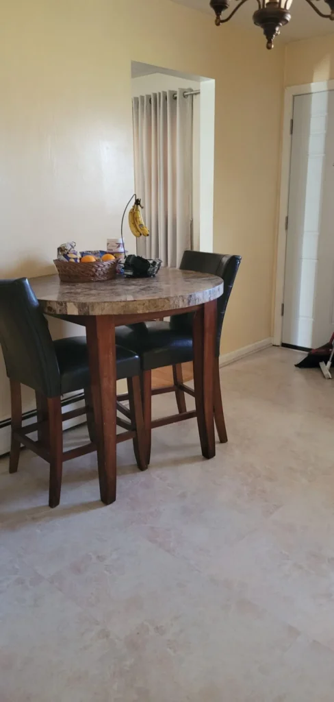 Sparkling clean tile floors in a Bristol, CT dining area after a deep kitchen cleaning
