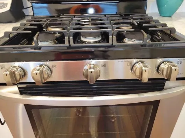 Clean gas stove and knobs in Bristol CT after deep kitchen cleaning