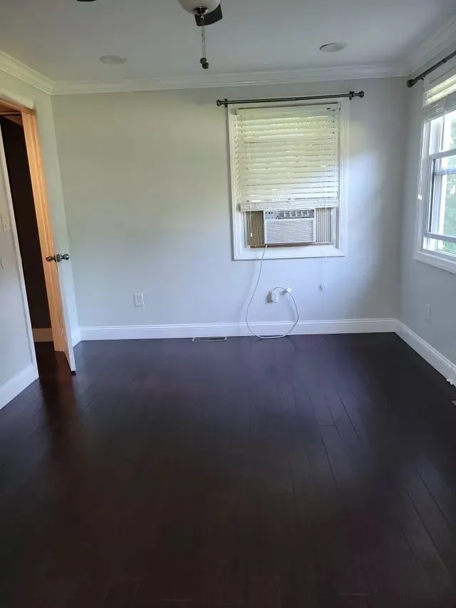 Clean hardwood floor in a freshly serviced bedroom in Warren County, New Jersey