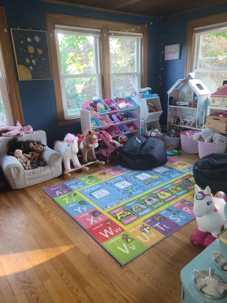 Deep cleaned children’s playroom with organized toys and colorful alphabet rug in Bristol, CT