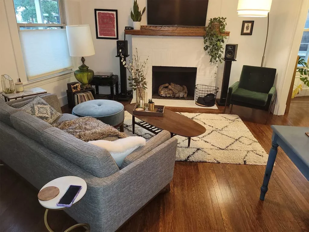 Professionally cleaned living room in New Haven, CT with spotless floors and organized decor
