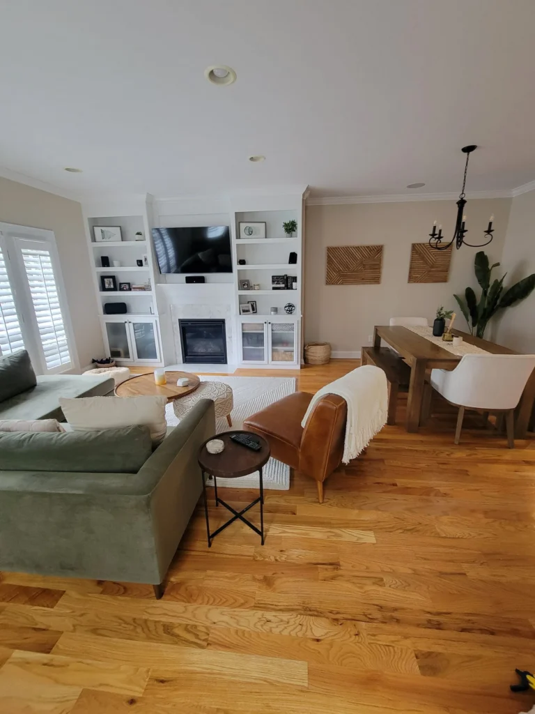 Professionally cleaned modern living room with built-in fireplace and hardwood floors in New Haven, Connecticut