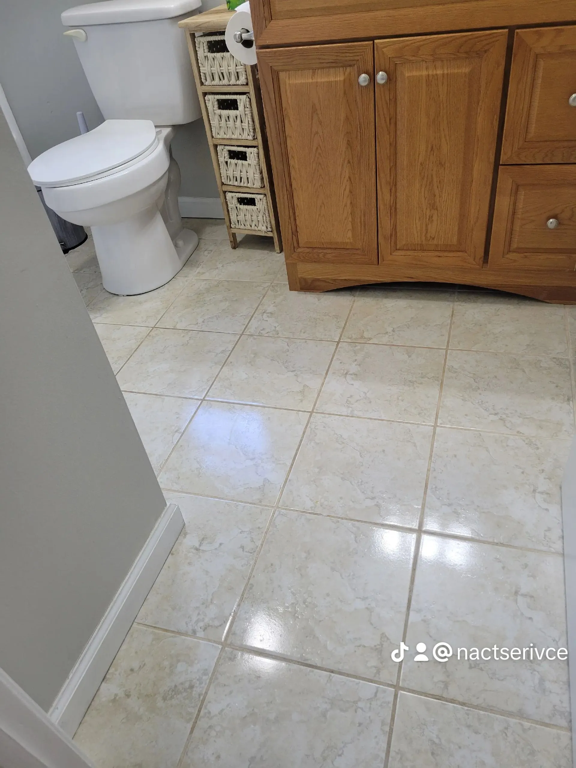 Shiny bathroom floor and sanitized toilet after a move-out cleaning in New Britain, Connecticut