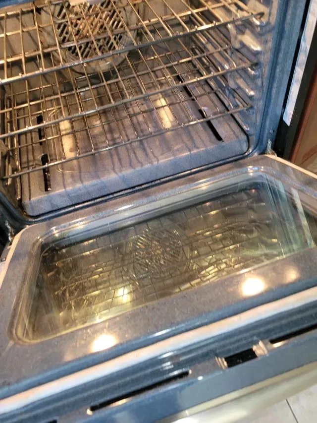 Inside view of a clean oven showing the racks and glass door in Bridgeport, CT