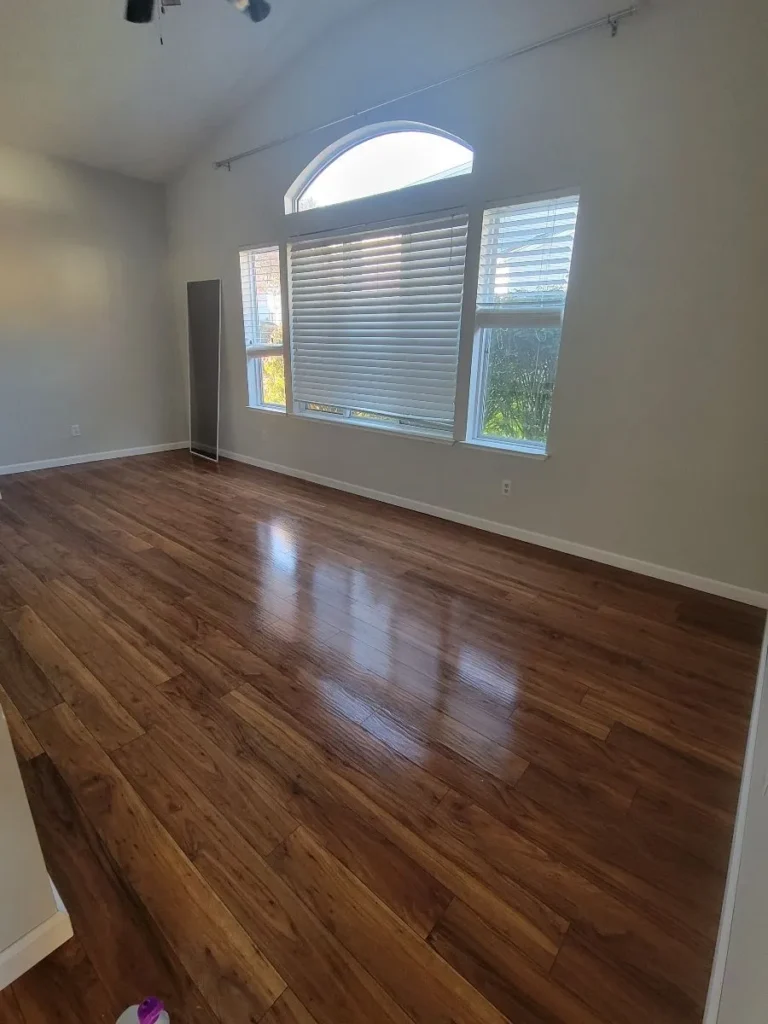 Sparkling wood floor in an empty room after deep cleaning in New Haven, CT